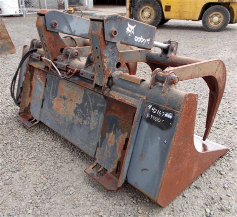 used skid steer with grapple bucket|bobcat skid steer grapple attachment.